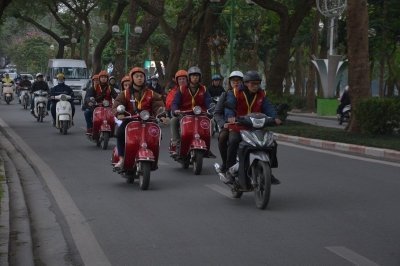 Explore Hanoi at Sunset Vintage Vespa Cultural and Historical Tour