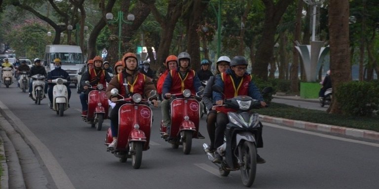 Explore Hanoi at Sunset Vintage Vespa Cultural and Historical Tour