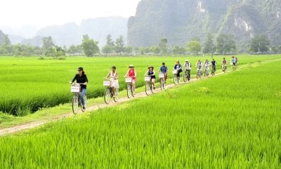 Trang An Boat Tour Experience: Discover Tranquil Beauty of Ninh Binh