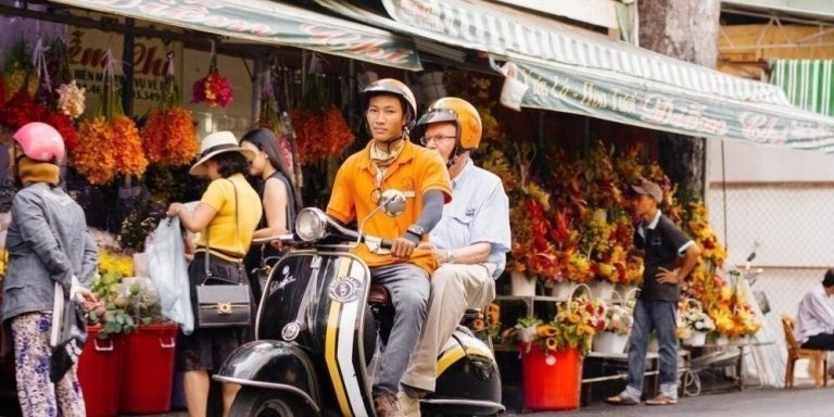 Explore Saigon's Best Street Food and Culture Private Motorbike Night