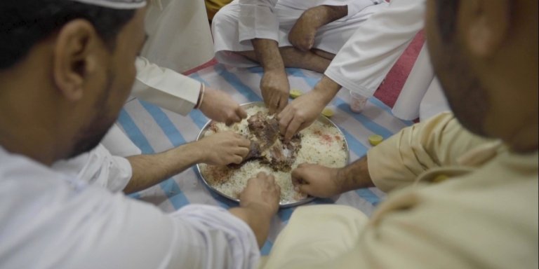 Gathering around a Traditional Omani Shuwa
