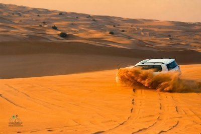 Desert safari dubai , camel ride , sand boarding & bbq dinner