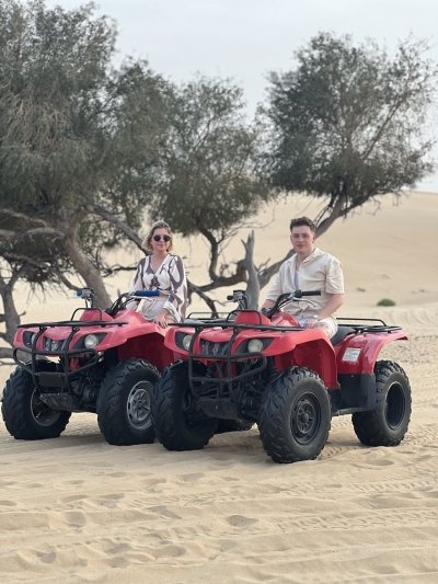Abu Dhabi Desert Safari with Camel Ride BBQ Dinner and Live Shows