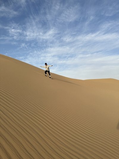 Abu Dhabi Morning Desert Safari with Camel Ride & Sandboarding