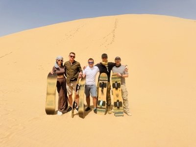 Morning Desert Safari Abu Dhabi with Camel Ride and Sandboarding