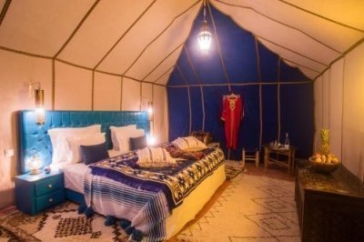 Authentic Sahara Nights: Desert Camp and Camel Ride Experience