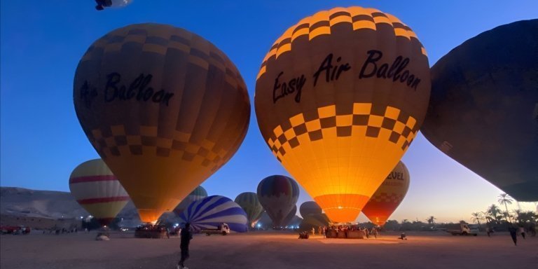 Sunrise Hot air Balloon over the ancient Luxor