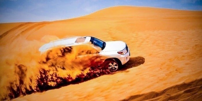 Dubai Morning Desert Adventure Dune Bashing & Sandboarding