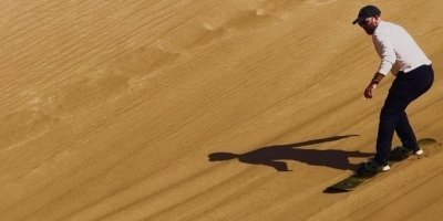 Essaouira Desert Quad and Sandboarding with Photos and Videos