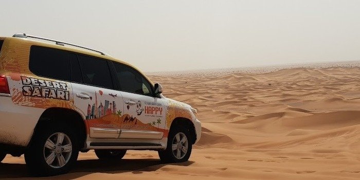 Dubai Desert Safari with BBQ Dinner, Camel Ride and Sand boarding