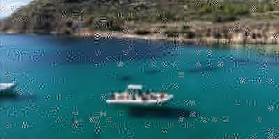 Cagliari: Boat Tour with 4 Swim Stops at Devil's Saddle