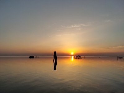 Golden Hour In The Venetian Lagoon By Boat