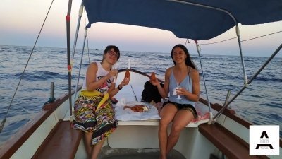 Boat tour from Aci Trezza with sunset aperitif on board