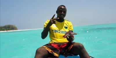 Snorkeling and Swimming with Dolphins in Mnemba island